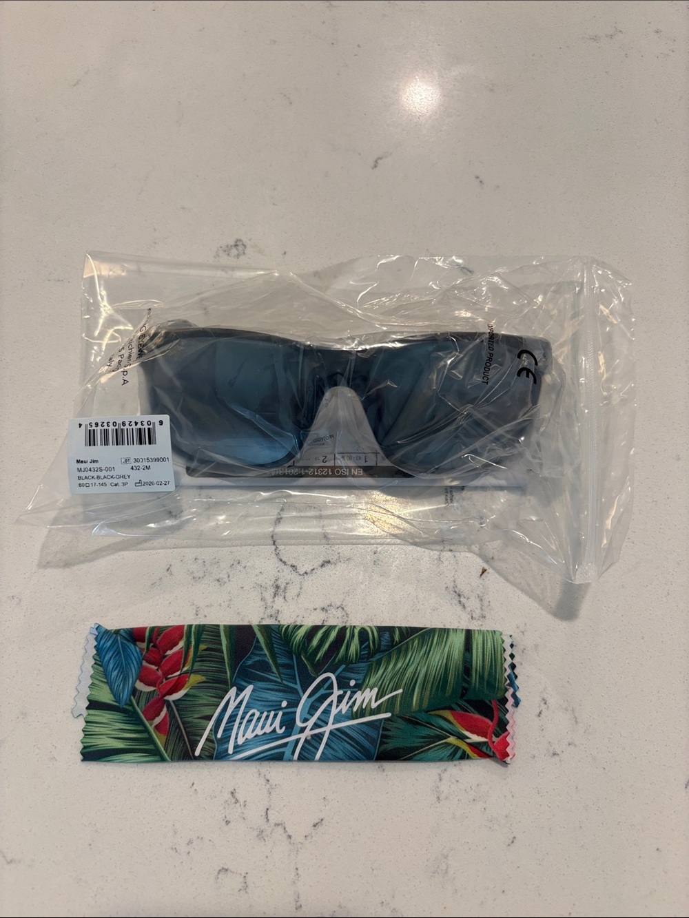 Maui Jim Polarized Sunglasses — Black Frames with Dark Lenses